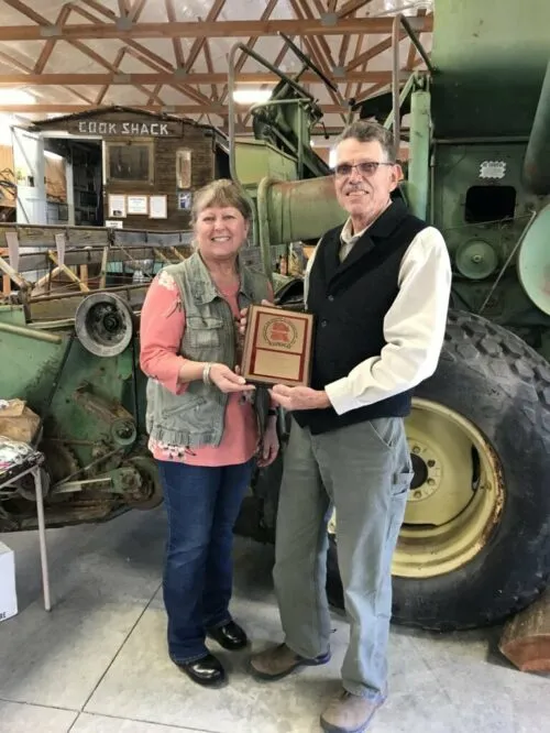 Arlin Colborg L to R: Judith Durfey, President of Branch 54, pictured making a HOF presentation to club member Arlin Colborg in 2021.